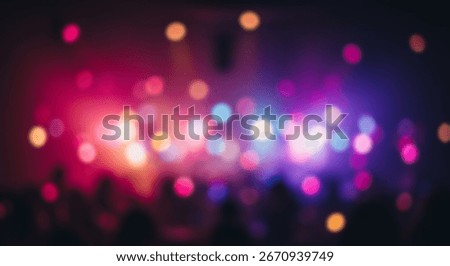 Vibrant bokeh lights create a dynamic, colorful, and energetic scene, showcasing a blur of people and illuminated spots in a lively concert hall.