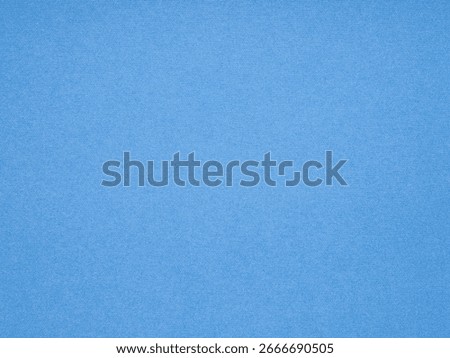 Vibrant cerulean blue texture with a subtle woven fabric impression