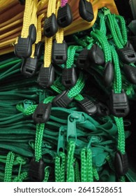A vibrant collection of Zipper pulls featuring various colors, including green,and yellow.These durable and functional accessories are perfect for enhancing bagus, clothing and crafts projects.