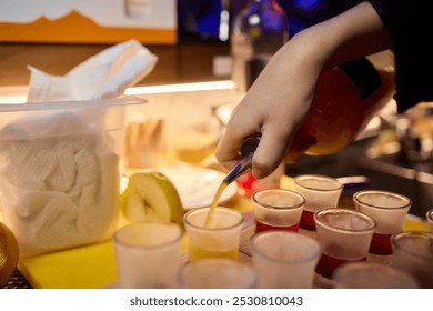 Vibrant and Colorful Shot Glasses Arranged on a Tray for a Fun and Lively Party Event - Powered by Shutterstock