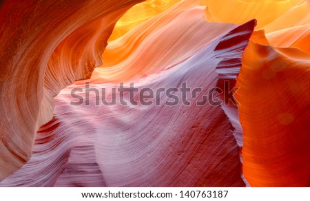 vibrant colors of eroded sandstone rock in slot canyon, antelope valley, page, arizona, usa. red rock wave eroded