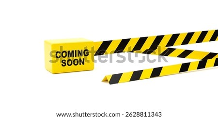 A vibrant Coming Soon cube sets a stage of anticipation, guarded by bright, contrasting caution tape. Simple design with a minimalist concept is on display.