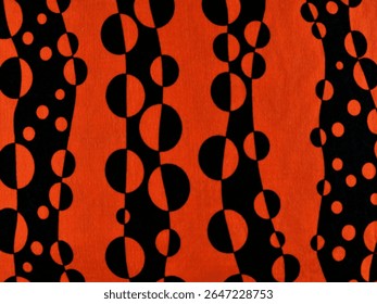 A vibrant and dynamic abstract pattern featuring black circles and half-circles arranged along undulating or wavy black stripes, set against a bright orange background. - Powered by Shutterstock - Get 15% off with code: PIKWIZARD15