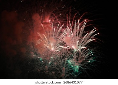 Vibrant Fireworks Exploding in the Night Sky. Related to holidays, New Year’s Eve, Independence Day, festivals, and public celebrations.