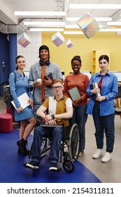 Vibrant Full Length Portrait Of Diverse Group Of Students Young Man With Disability In Foreground All Looking At Camera