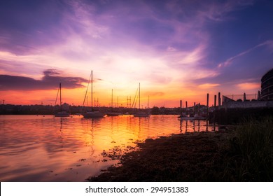 Vibrant Harbor Sunset with Boats - Powered by Shutterstock