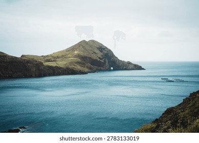 Vibrant landscape features a dramatic coastline, showcasing an island, blue sea, and captivating rock formations. Sao Lourenco, Madeira, Portugal
