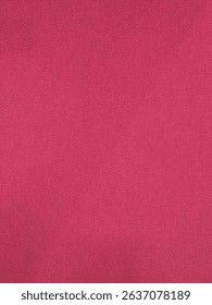 Vibrant magenta surface with a subtle texture.  Solid color, even tone.  Suitable for use as a background, backdrop or material sample. Can be used in various contexts, such as digital design.