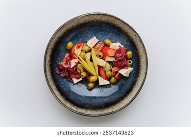 Vibrant Mediterranean salad with tomatoes, olives, cheese, and pickled onions, healthy meal - Powered by Shutterstock