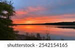 A vibrant Midwest sunset on Monroe Lake in Bloomington, Indiana.