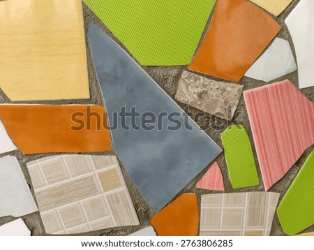Vibrant Mosaic Artwork Displaying Assemblage of Colored Tiles. Array of brightly colored and textured tiles arranged in captivating mosaic pattern. Full frame. Close-up. Copy space