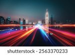 Vibrant night cityscape of Shenzhen, China. Light trails streak across a reflective waterway, showcasing the city