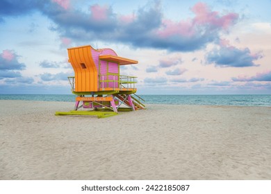  Vibrant, pastel view of lifeguard tower colorful painted under bright blue sky on South Beach, Miami, Florida. - Powered by Shutterstock