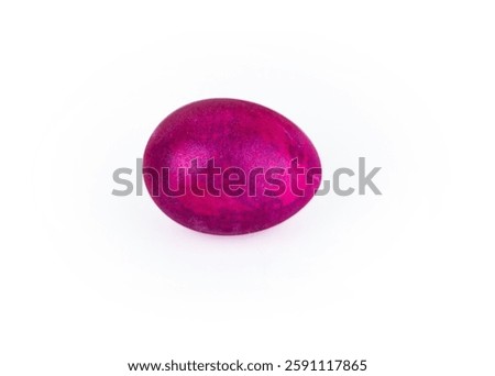 Vibrant pink easter egg with  glowing shell pattern, isolated on white background. Color contrast, creativity, holiday decoration, creativity, symbolism of rebirth. Copy space. Selective focus