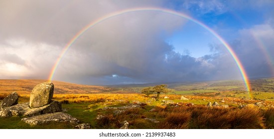 Vibrant Rainbows Over Combestone Tor On Dartmoor Devon In The West Country Of England UK