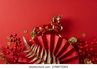 Vibrant red backdrop featuring a decorative horse statue atop a stylized fan, gold coins, and red berries to evoke prosperity, luck, and festive Chinese New Year greetings