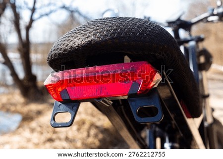 Vibrant red e-bike tail light ensuring road safety
