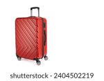 A vibrant red hard-shell suitcase stands isolated against a white background, ready for travel