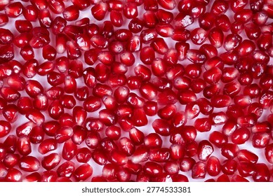 Vibrant ruby arils elevate sophisticated confections beautifully crafted. Shiny pomegranate seeds artfully scattered reveal refined culinary artistry and bright flavors