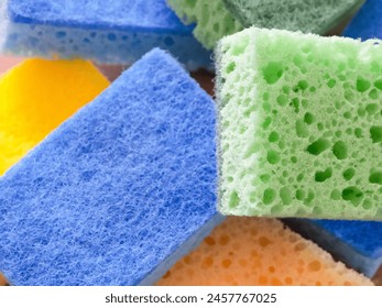 Vibrant Scrub Sponges. Brightly colored sponges with a focus on texture. Uses for Online retail, cleaning tutorials. - Powered by Shutterstock