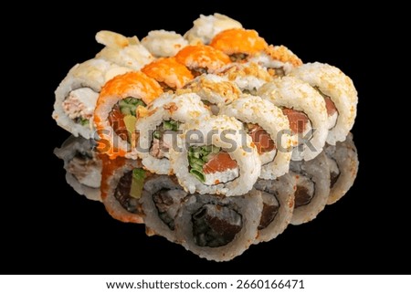 A vibrant selection of assorted sushi rolls filled with fresh fish, cream cheese, and vegetables, topped with sesame seeds and colorful roe on a glossy black background.