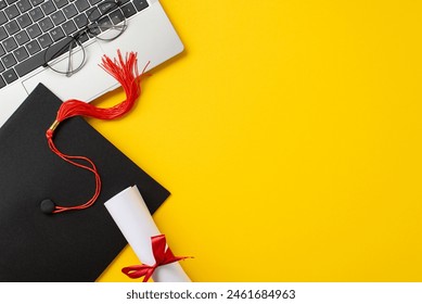 A vibrant setup featuring a graduation cap with a red tassel, diploma, glasses, and a laptop on a yellow background symbolizing online education and graduation achievements - Powered by Shutterstock