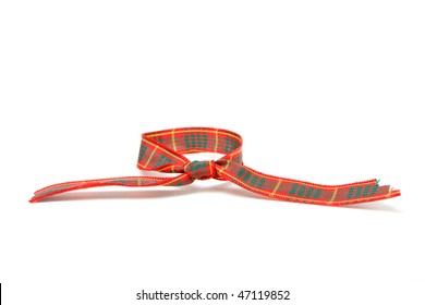 Vibrant Tartan Ribbon Isolated Against White Background.