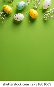 Vibrant vertical Easter eggs in pastel hues lay on a lively green backdrop, accented by delicate white flowers. A cheerful, springtime scene perfect for Easter greetings and seasonal promotions