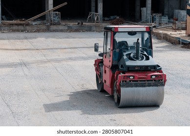 Vibratory compactor machine preparing ground for new infrastructure development