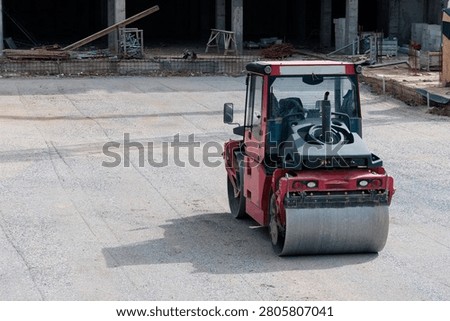 Vibratory compactor machine preparing ground for new infrastructure development