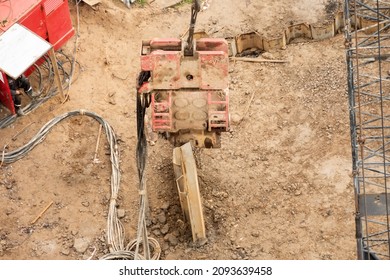 Vibro electric hammer machine installation driving retaining wall steel sheet pile for the protection underground sliding of soil under the construction site