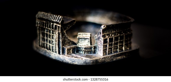 Vicente Calderón Football Stadium. Golden Replica Of The Famous Soccer Team Atlético De Madrid Stadium Over A Black Background