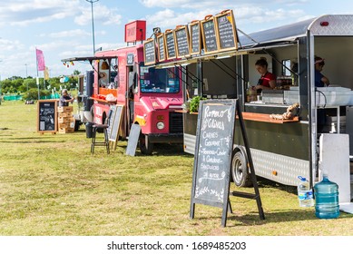 Vicente Lopez, Argentina - December 21, 2019: Food Trucks And People At A Street Food Market