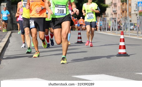 Vicenza, Italy. 20th September 2015.  Marathon runners during the race called "Mezza di Vicenza" in city street of Vicenza in Northern Italy.The runners have raced meters 21097