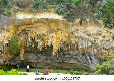 Victoria Australia - March 17 2020; Three tourists returning from stalactite cave at Loch Ard on Great Ocean Road.