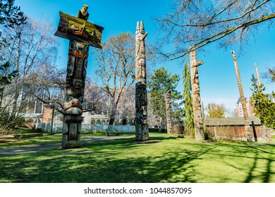 Victoria, BC, Canada - 11 March 2018.
Beautiful day in Thunderbird park.  Original totem poles carved by indigenous Canadians. The park located near the Royal BC Museums.