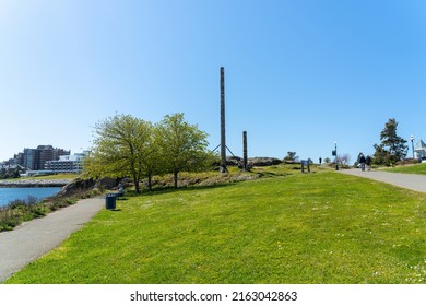 Victoria, BC, Canada - April 14 2021 : Songhees Point Park Totem Pole.