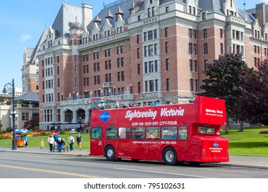 Victoria, B.C. Canada - Aug 26 2017:  Red - Site Seeing - Bus Waiting For Tourists At The Empress Hotel In Victoria. 