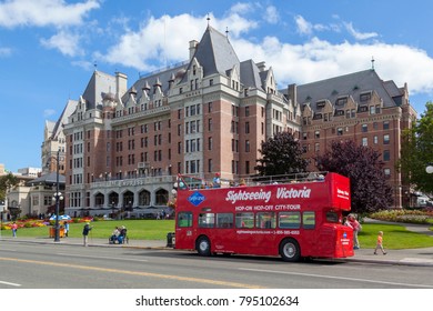 Victoria, B.C. Canada - Aug 26 2017:  Red - Site Seeing - Bus Waiting For Tourists At The Empress Hotel In Victoria. 