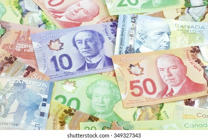 Victoria BC - Monday, March 3, 2014: Background shot of Canadian banknotes, Canadian banknotes are the banknotes or bills of Canada, photographed in Victoria, BC, Canada.