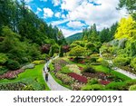 Victoria, British Columbia, Canada - Tourists at Butchart Gardens Sunken Garden