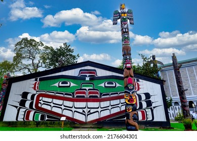 VICTORIA, BRITISH COLUMBIA - May 1, 2022: Totem Poles Are Monuments Created By First Nations Of The Pacific Northwest To Represent And Commemorate Ancestry, Histories, People, Or Events.