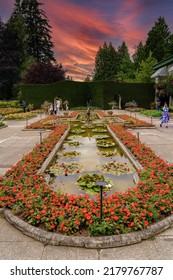 Victoria, Canada - 7-11-2022: People Enjoying The Italian Garden In A Botanical Garden Near Victoria BC, Canada