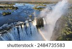 Victoria Falls At Livingstone In Northern Rhodesia Zambia. Nature Waterfall. Zambezi River Landscape. Livingstone At Northern Rhodesia Zambia. Southern Africa. Tourism Travel.