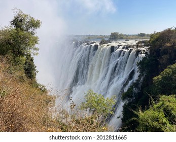 Victoria Falls In Zambia At The Border Of Zambia And Zimbabwe.