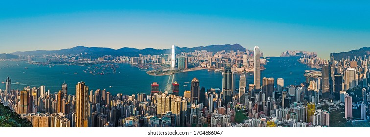 Victoria, Hongkong - January 9, 2010: Hong Kong View From Victoria Peak To The Bay And The Skyscraper Ins Sunset, Victoria, Hongkong.