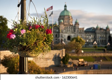 Victoria Inner Harbor Hanging Basket. With the historic Parliament Building in the background the beautiful decorative hanging baskets liven up the waterfront.