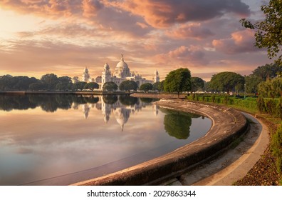 Victoria Memorial Kolkata with adjoining garden and lake at sunset - Powered by Shutterstock