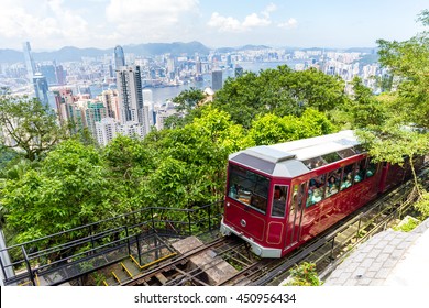 Victoria Peak Tram and Hong Kong city skyline - Shutterstock ID 450956434