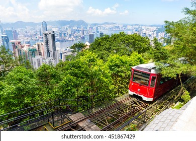 The Victoria Peak Tram And Hong Kong City Skyline